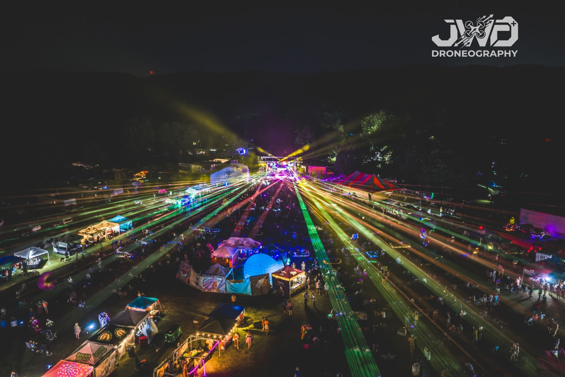 Aerial view of lasers over the festival grounds