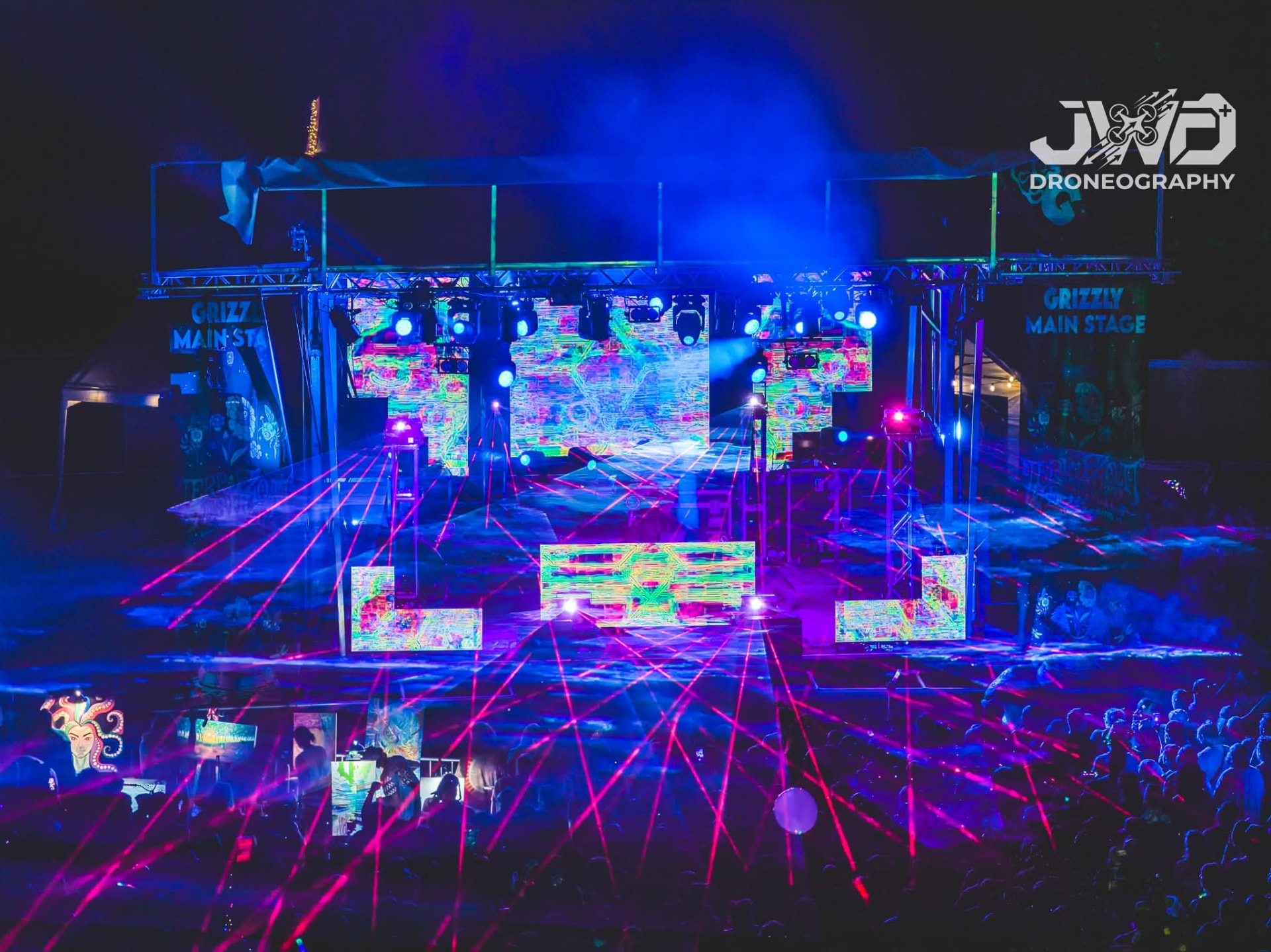 Blue haze and lasers over the main stage
